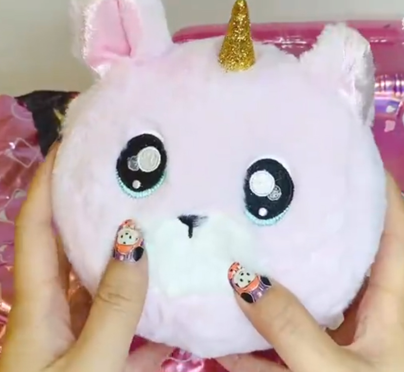 nanana surprise pom keychan bag