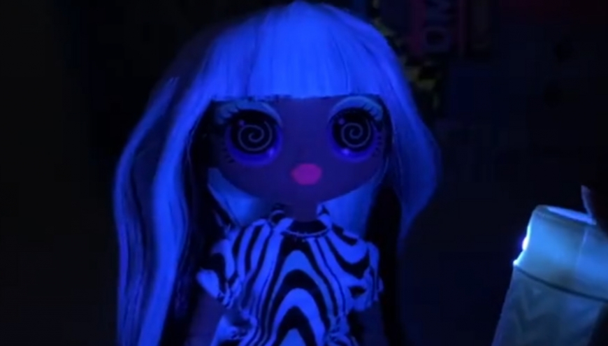 LOL OMG Lights Groovy Babe doll under black light