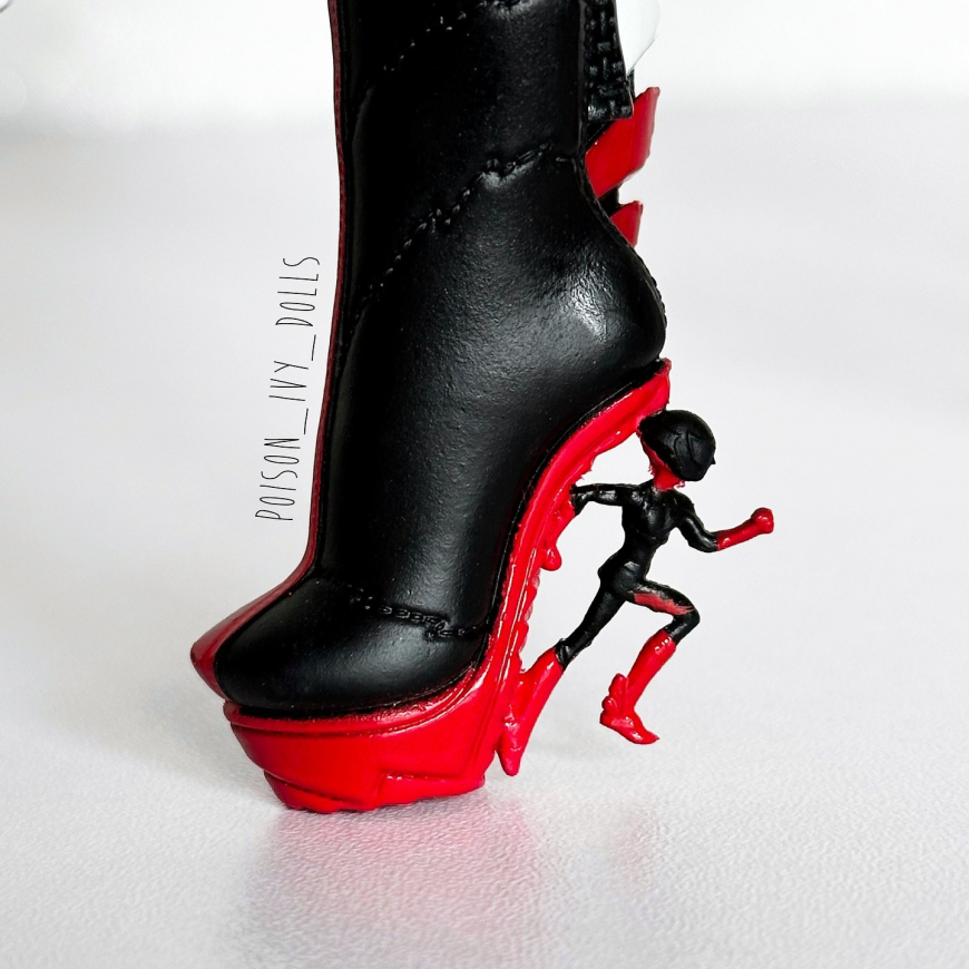 A comparison of the old and new Deadfast Ghoulia Yelps doll