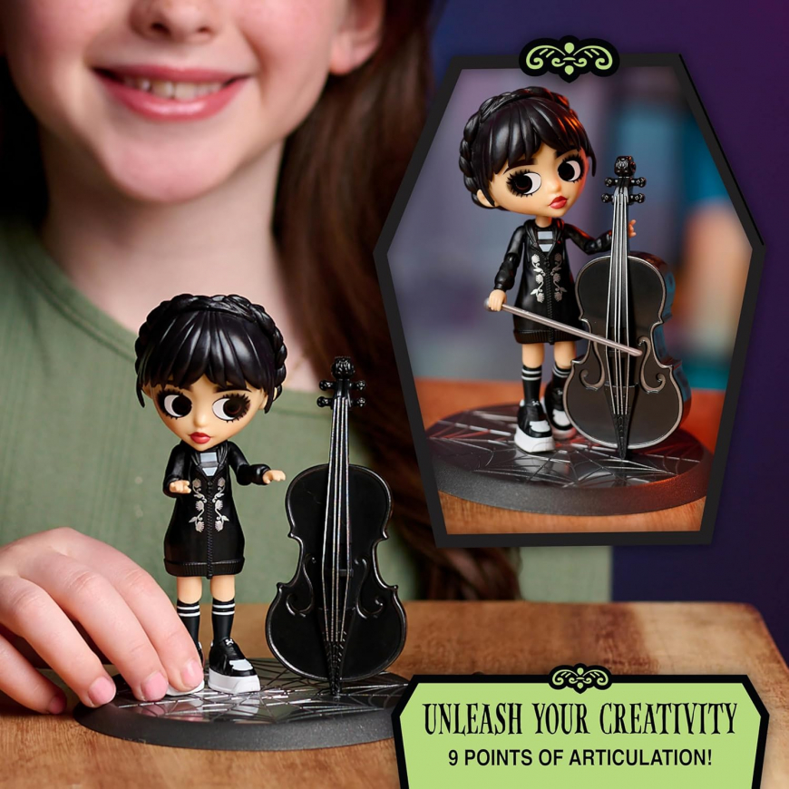 Wednesday Deluxe 6-inch figure with 2 interchangeable face and hair plates from Just Play