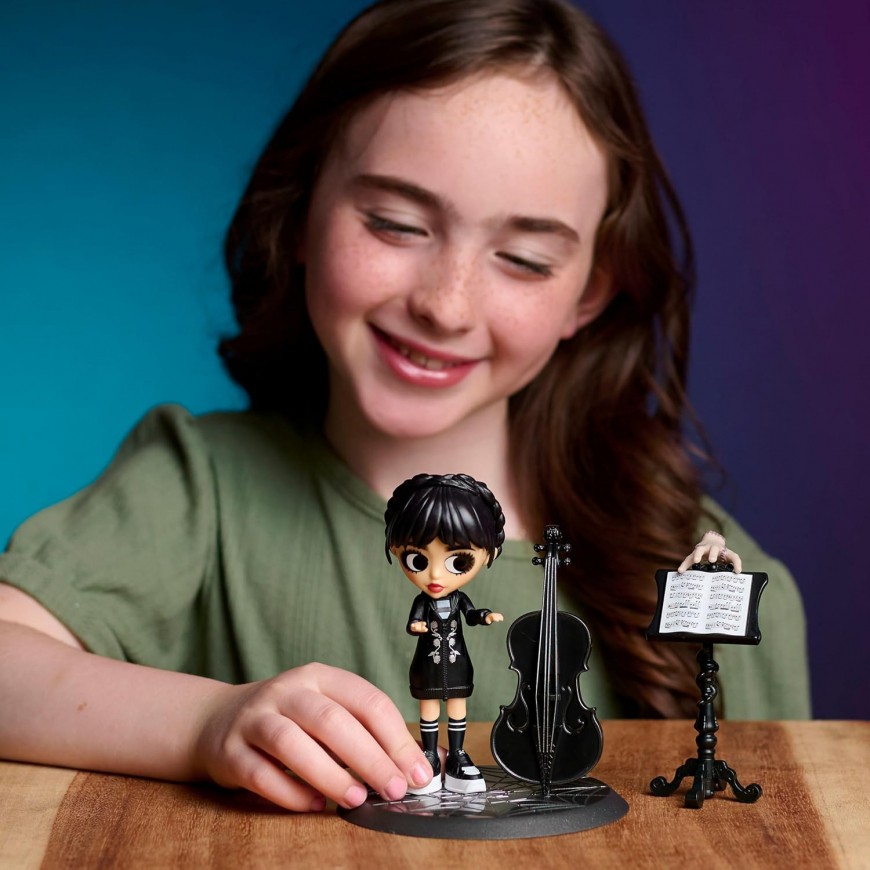 Wednesday Deluxe 6-inch figure with 2 interchangeable face and hair plates from Just Play