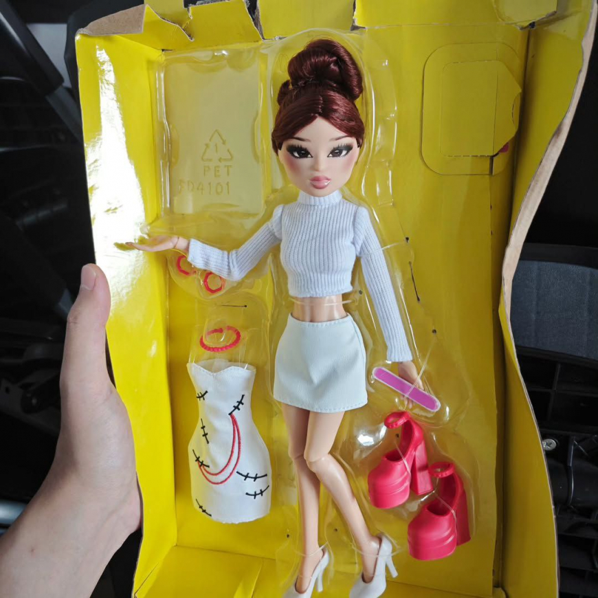 In real life photos of Dress to Impress Lana doll